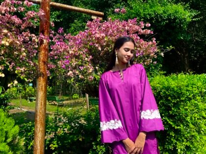 Women's purple Pakistani suit with white floral lace sleeves by Shaenor